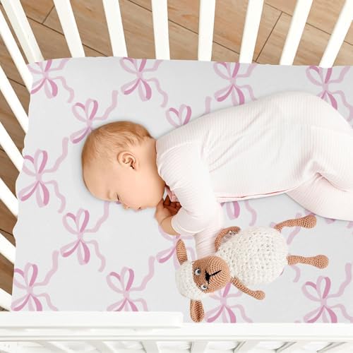 Coquette Pink Crib Sheets with Stretchy Bow Design